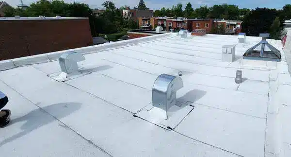 Réalisations Toitures JSB Toit plat membrane élastomère St-Léonard.